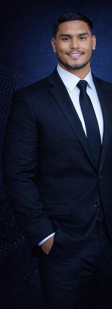 Freddy Narvaez, social media and growth specialist, smiling in a navy suit